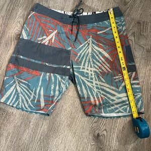 Volcom Blue and Orange Board Shorts with Tropical Print
